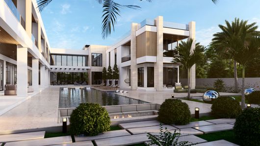 Modern white apartment complex with balconies, a central courtyard fountain, and palm trees at sunset
