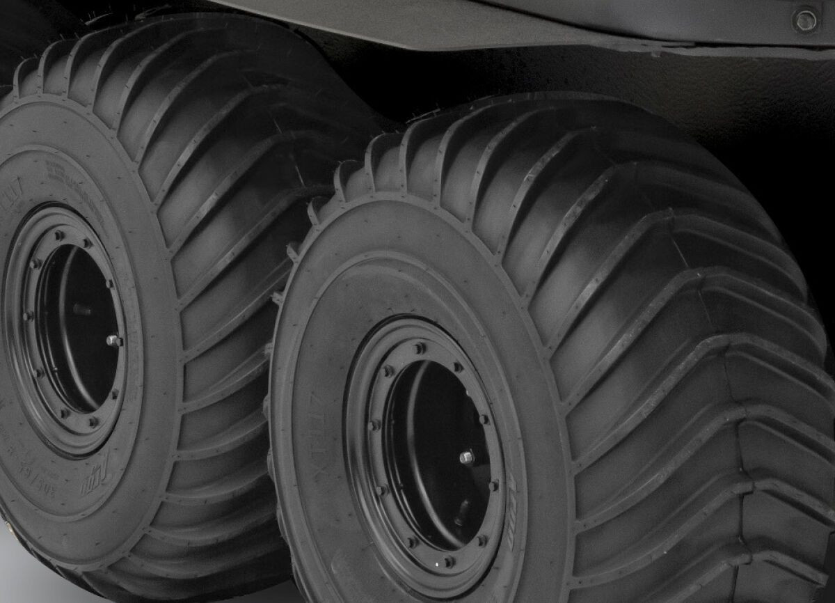 a close up of a vehicle 's tires with the numbers 700 on them