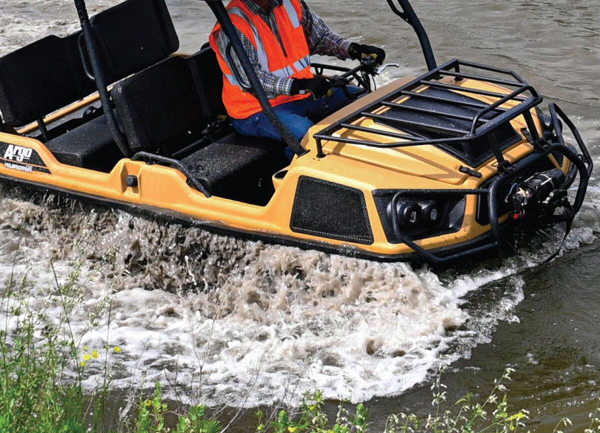 Yellow XTV on water.