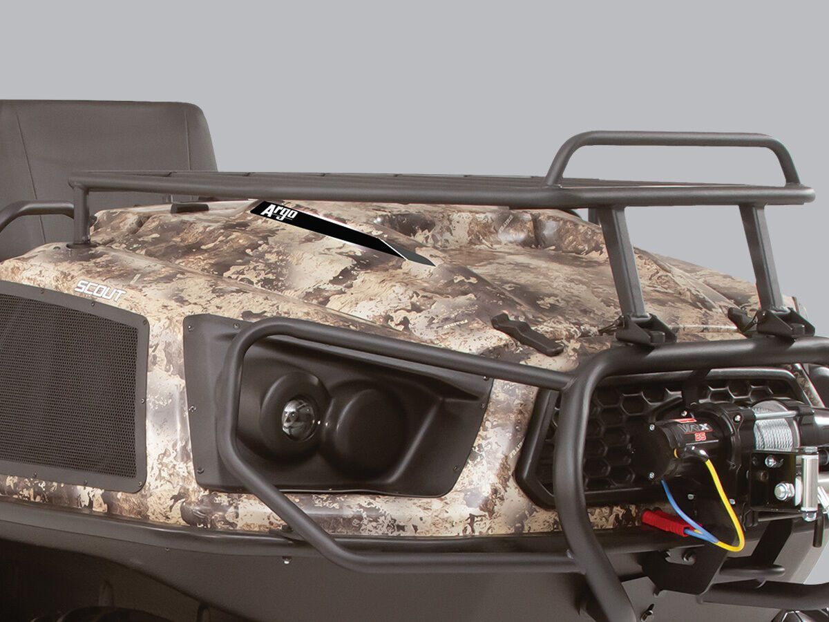 a camo vehicle with the word scout on the front