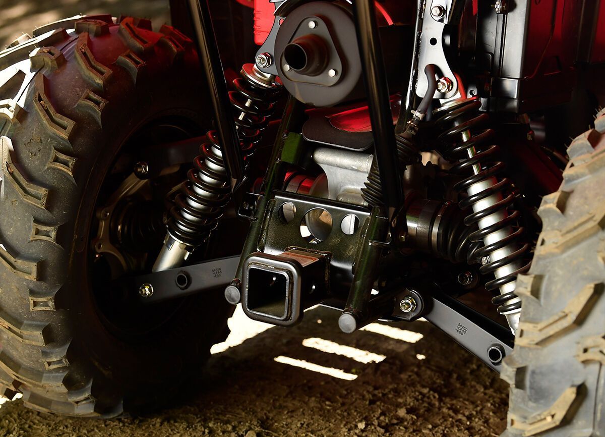 A hitch on a red ATV.