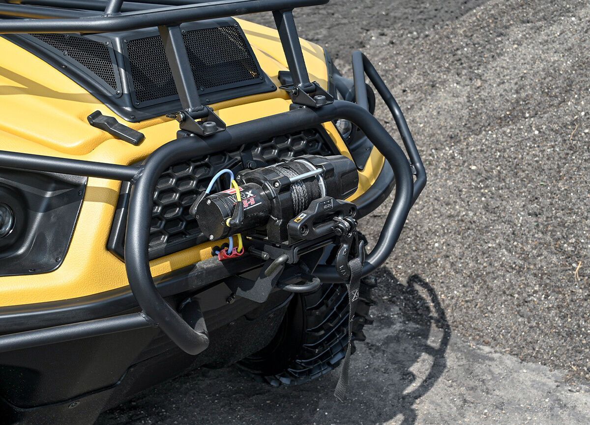 The front brush guard in black and the synthetic winch rope in the front of the XTV.
