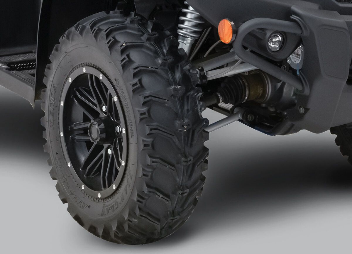 Close up of the suspension system on the ATV.