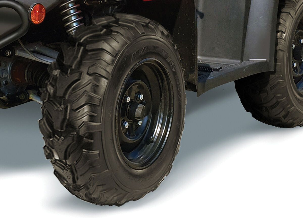 24 inch off-road tires with steel rims.