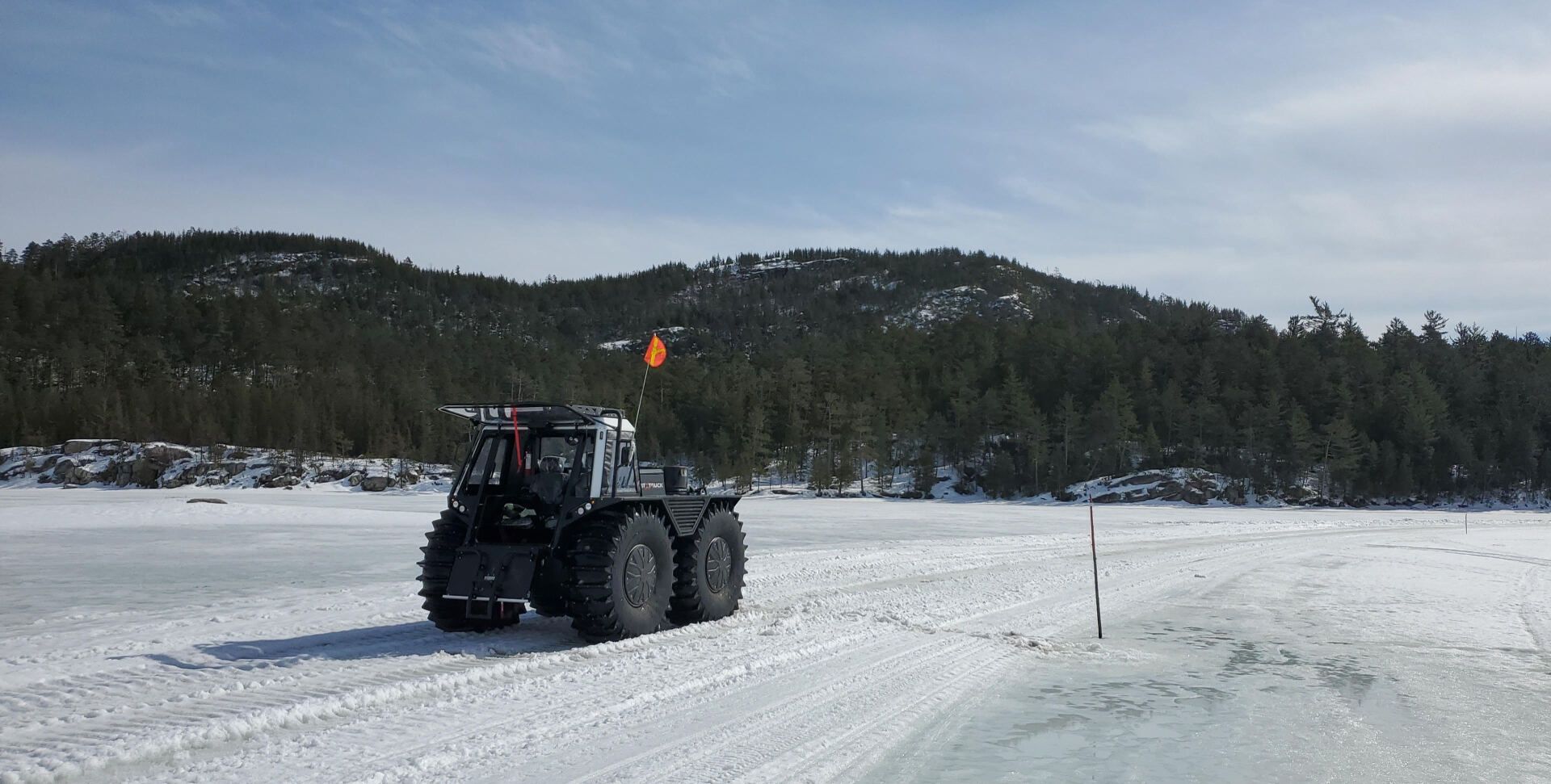 Fat Truck traveling over snow and ice.
