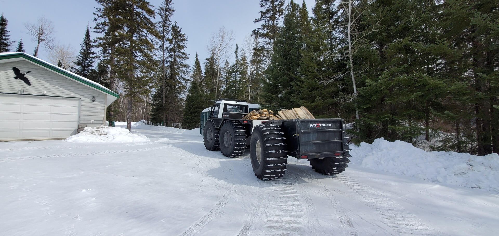 Fat Truck 2.8 P with an additional trailer to haul material.