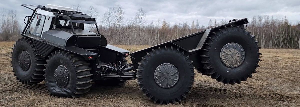 Fat Truck 8x8 Hauler in a field.