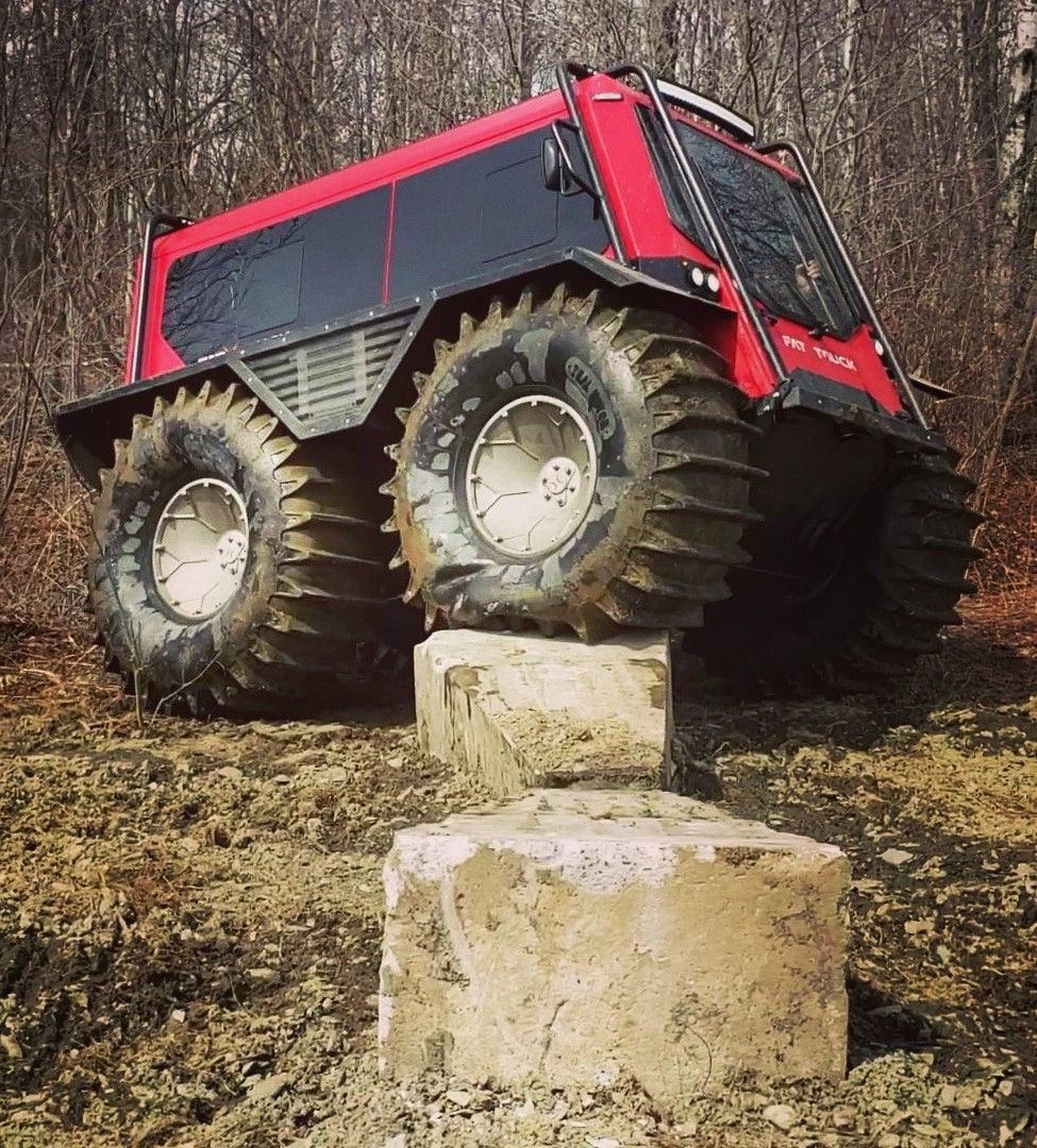 A Fat Truck's tire pressure adjusting as it travels over large rocks.