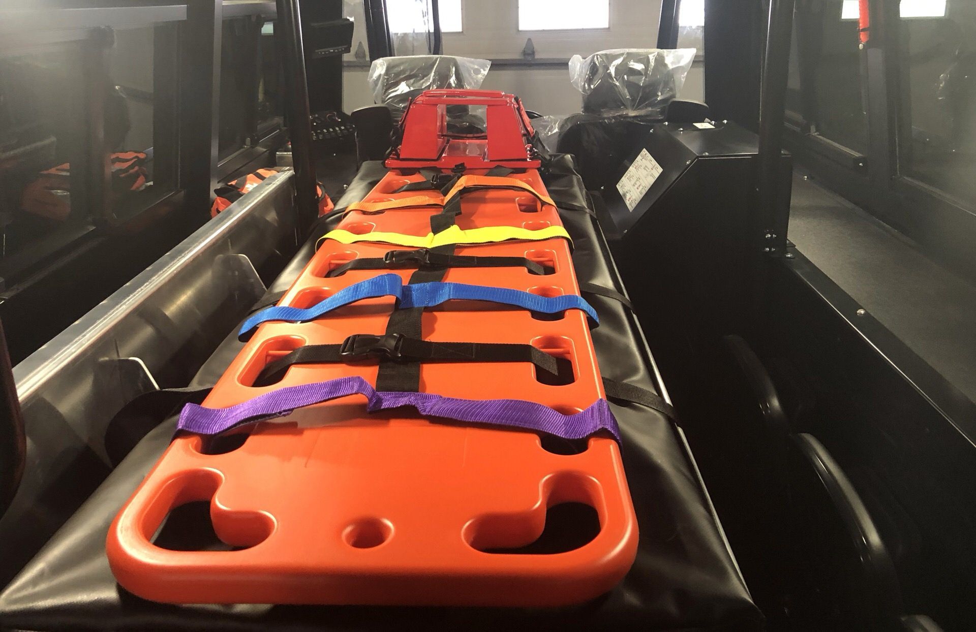 An orange stretcher in the Fat Truck.