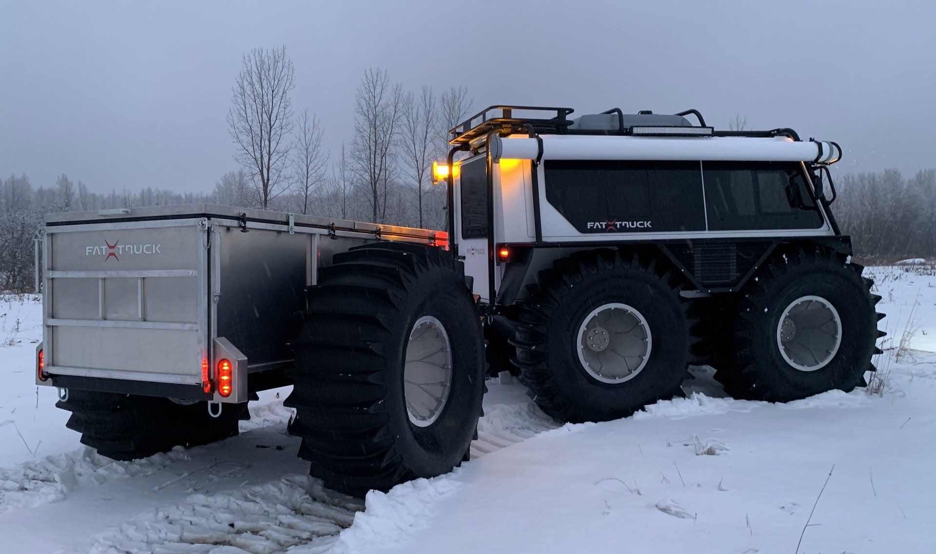 A Fat Truck 2.8C Wagon with amphibious trailer.