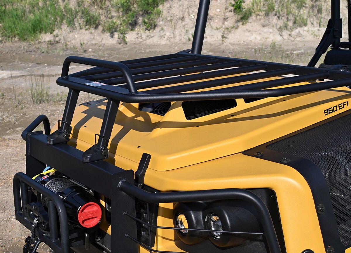 a yellow vehicle with a black roof rack that says 950 ef1