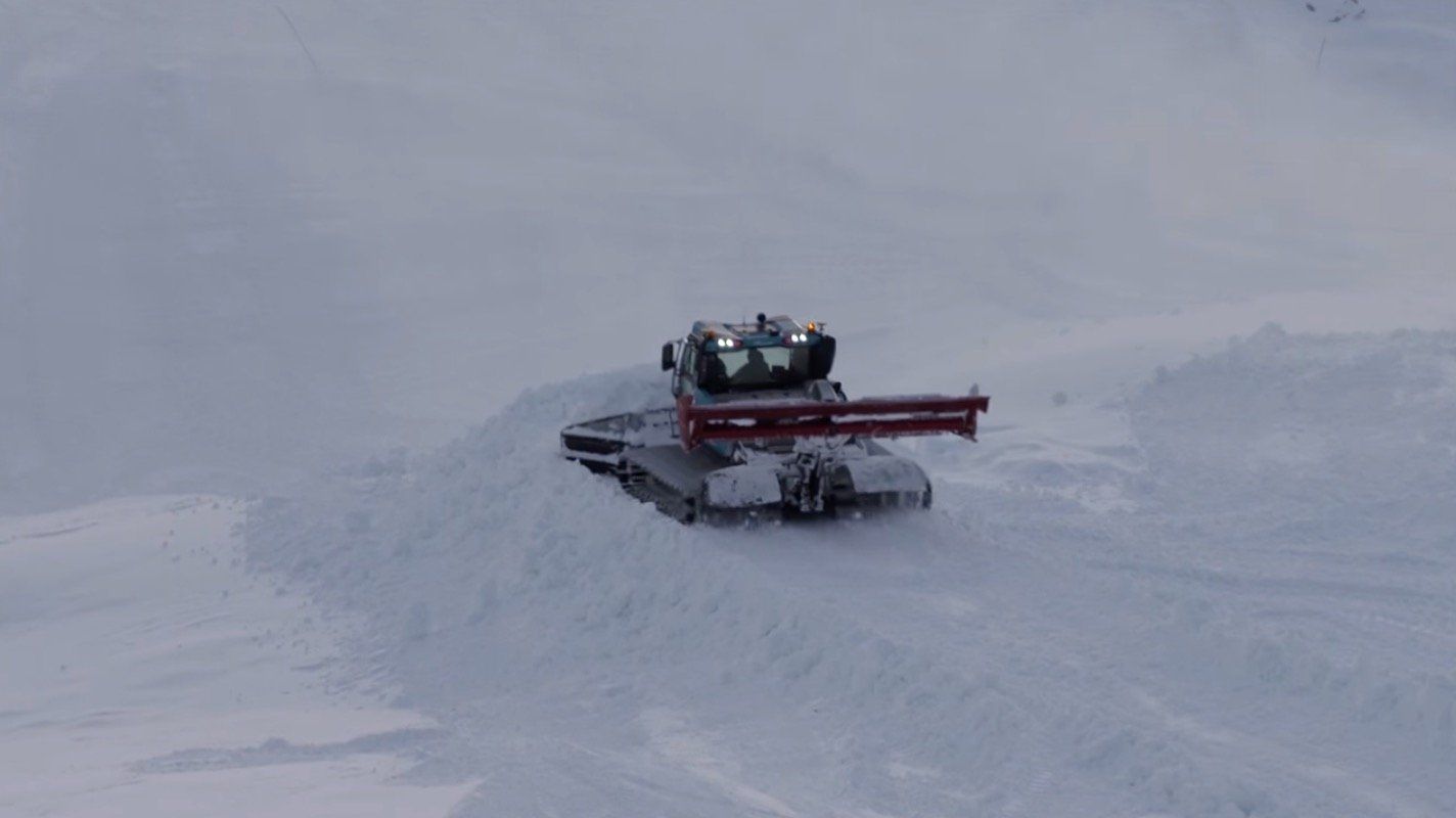 Prinoth Bison Alpine Ski grooming in the snow.