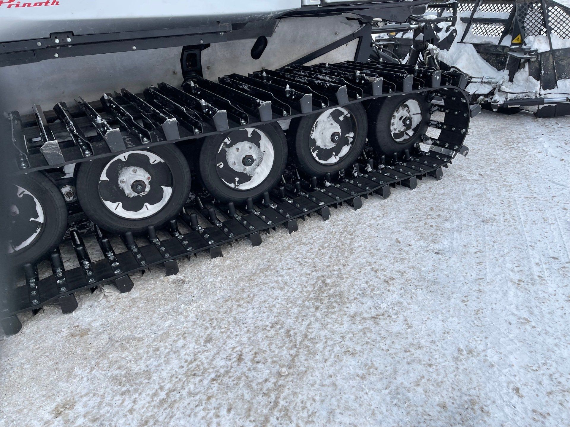 Prinoth Bison narrowed tracks for trail grooming.