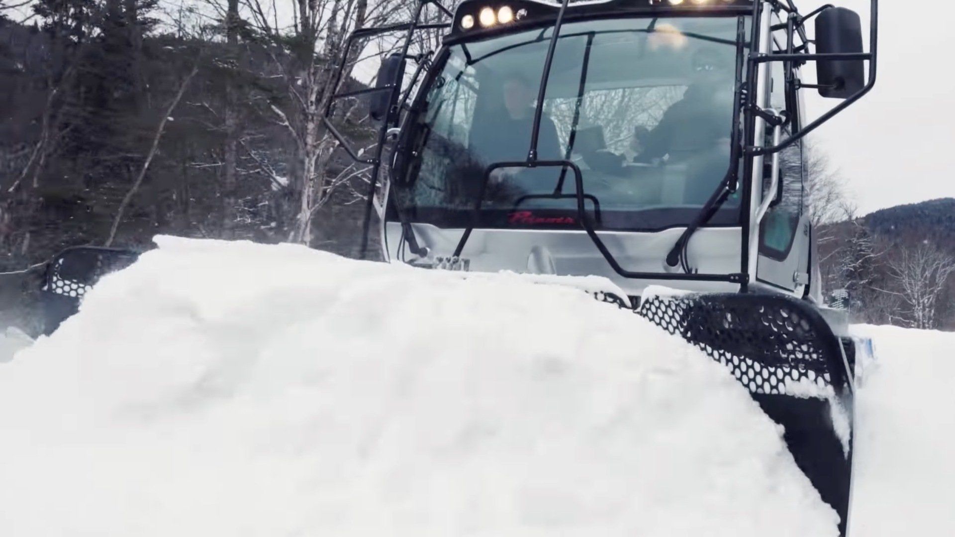 Prinoth Husky snow grooming trails Ontario Manitoba.