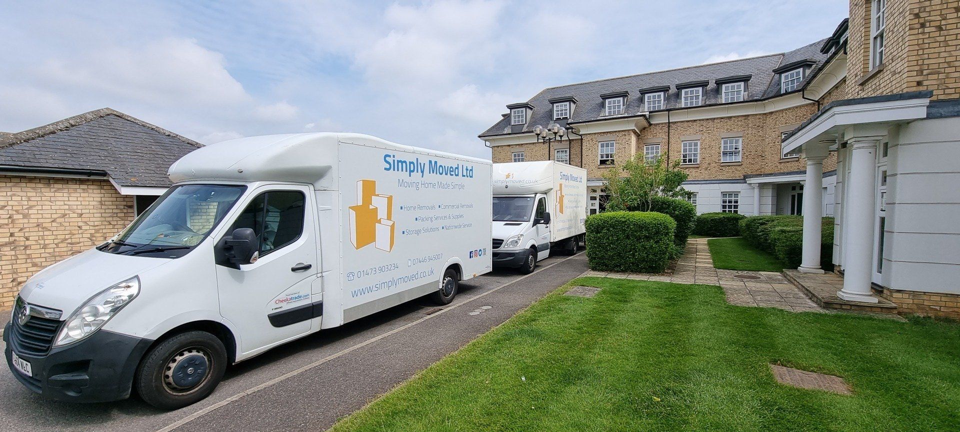 2 removal vehicles in use during a house move in Newmarket Suffolk by Simply Moved Ltd