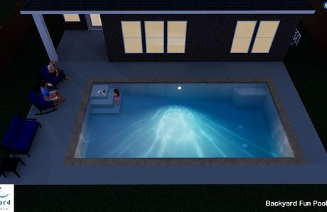An aerial view of a backyard swimming pool at night.