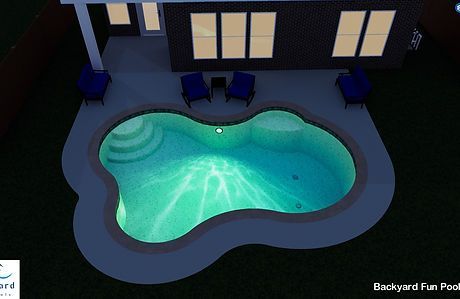 An aerial view of a backyard fan pool at night