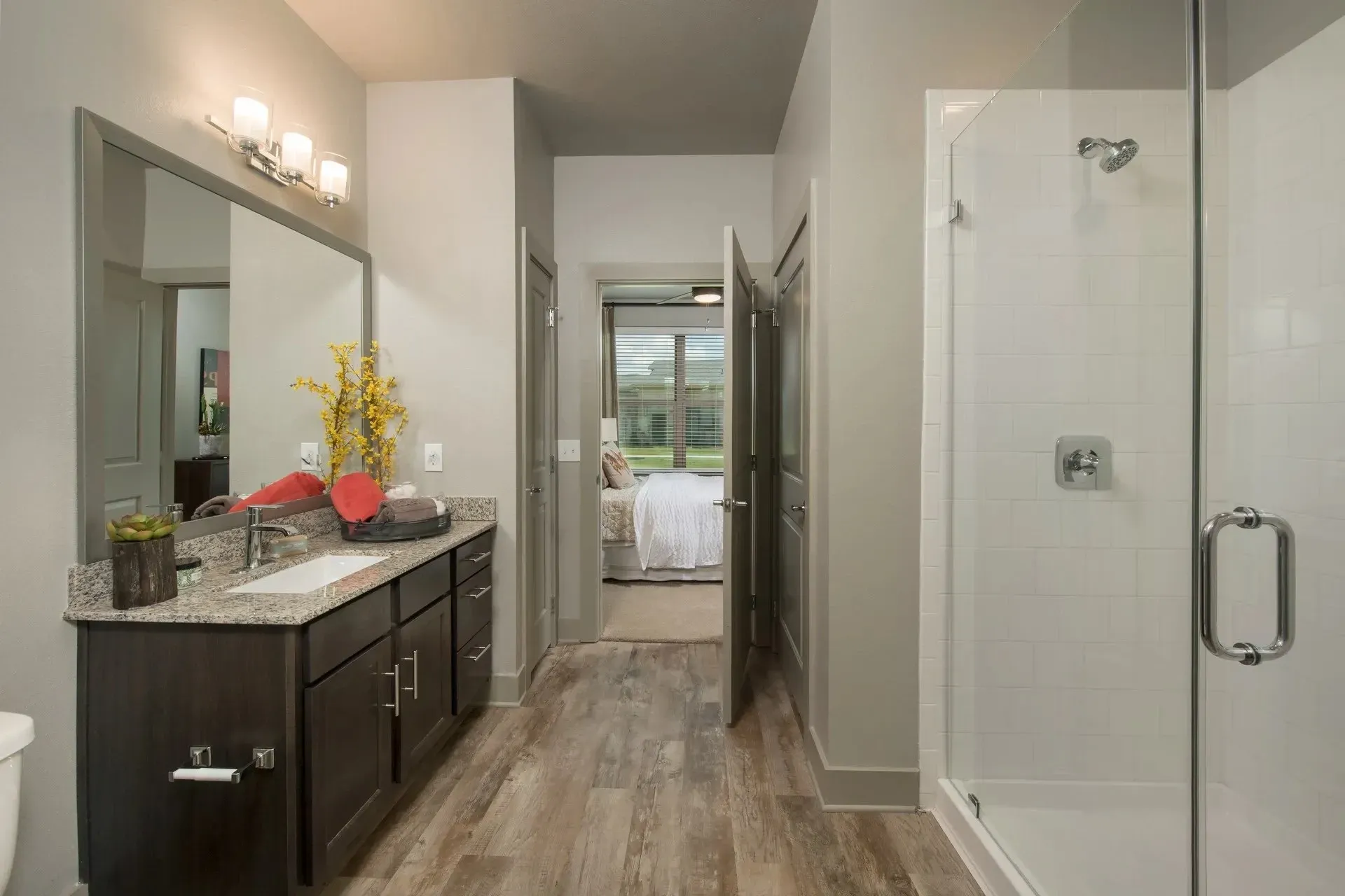 Modern bathroom with sink, mirror, and shower