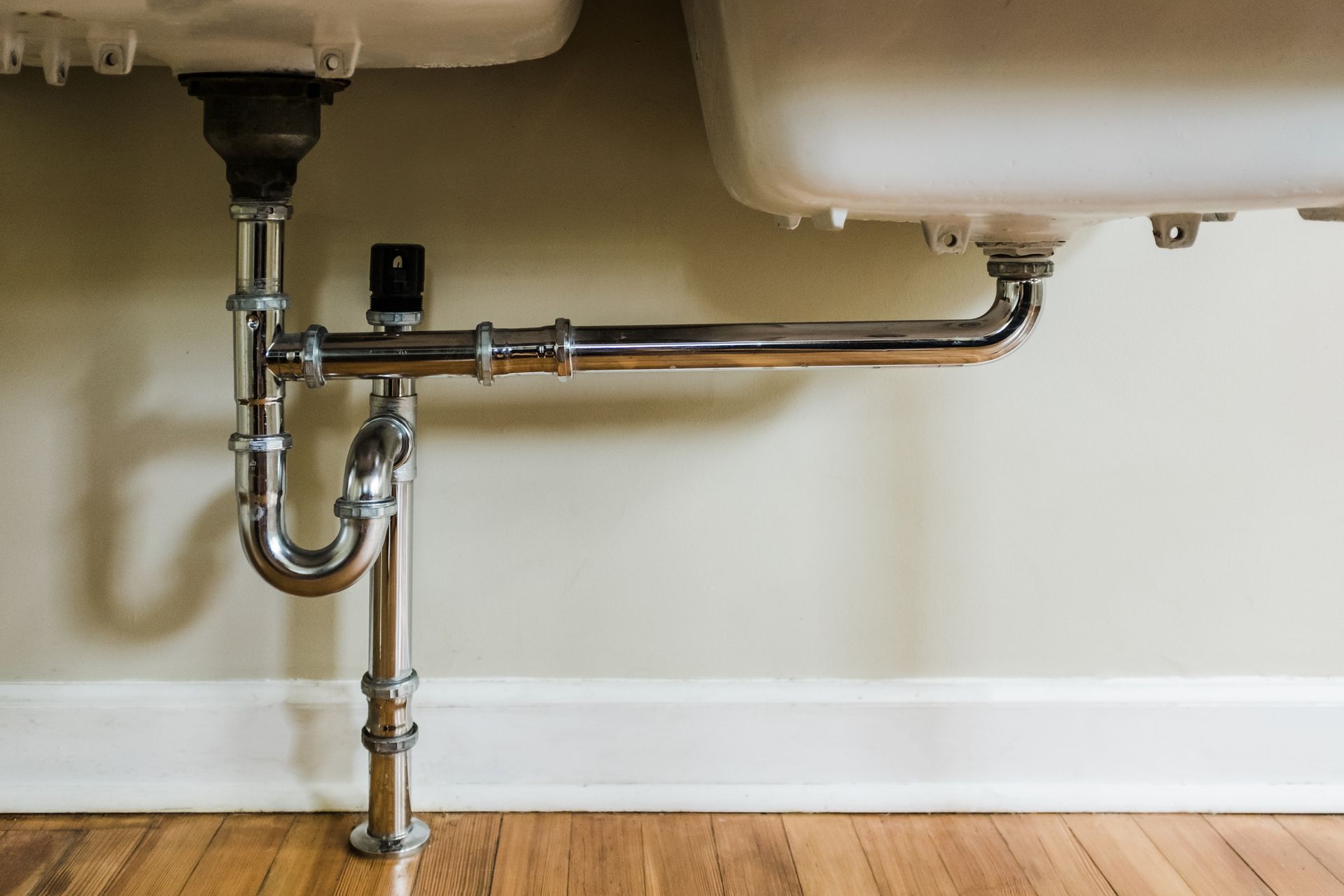 A Sink with A Plumbing Pipe Underneath It | Neenah, WI | Ogden Plumbing