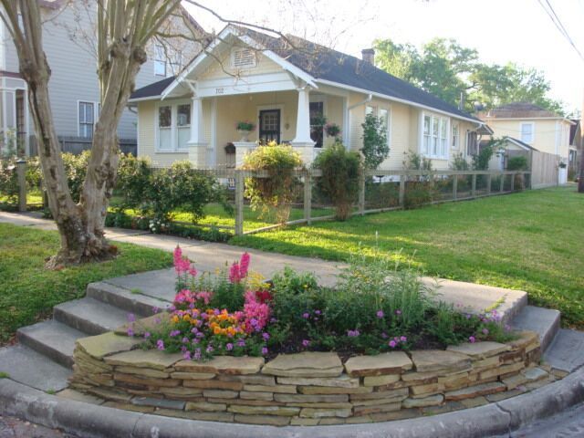 A garden filled with lots of plants and rocks.