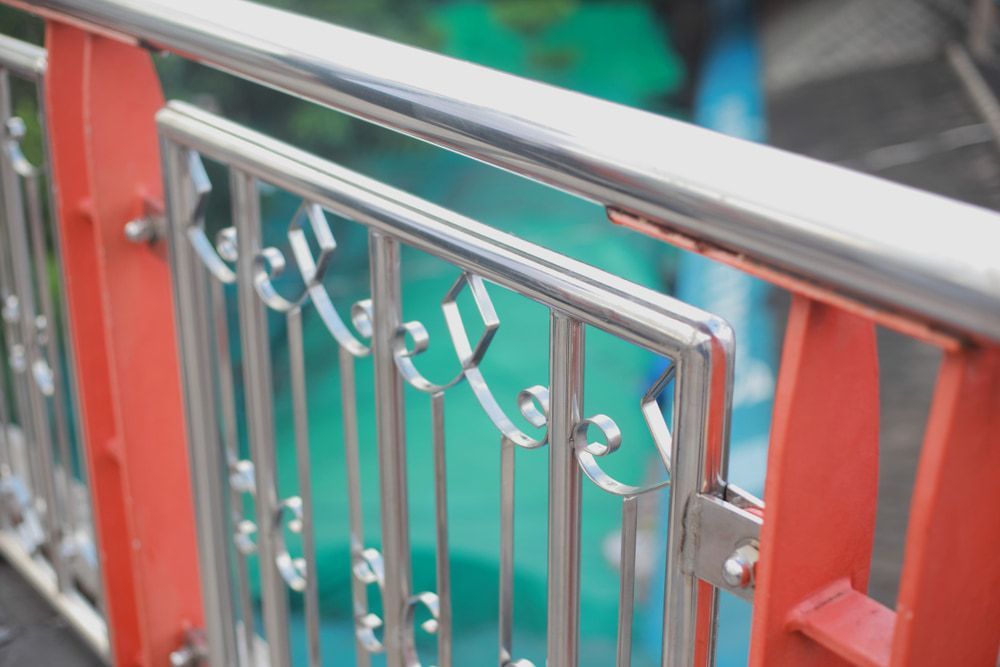 A Close up Of a Stainless Steel Railing on A Bridge — Rearden Fencing Pty Ltd in Toronto, NSW