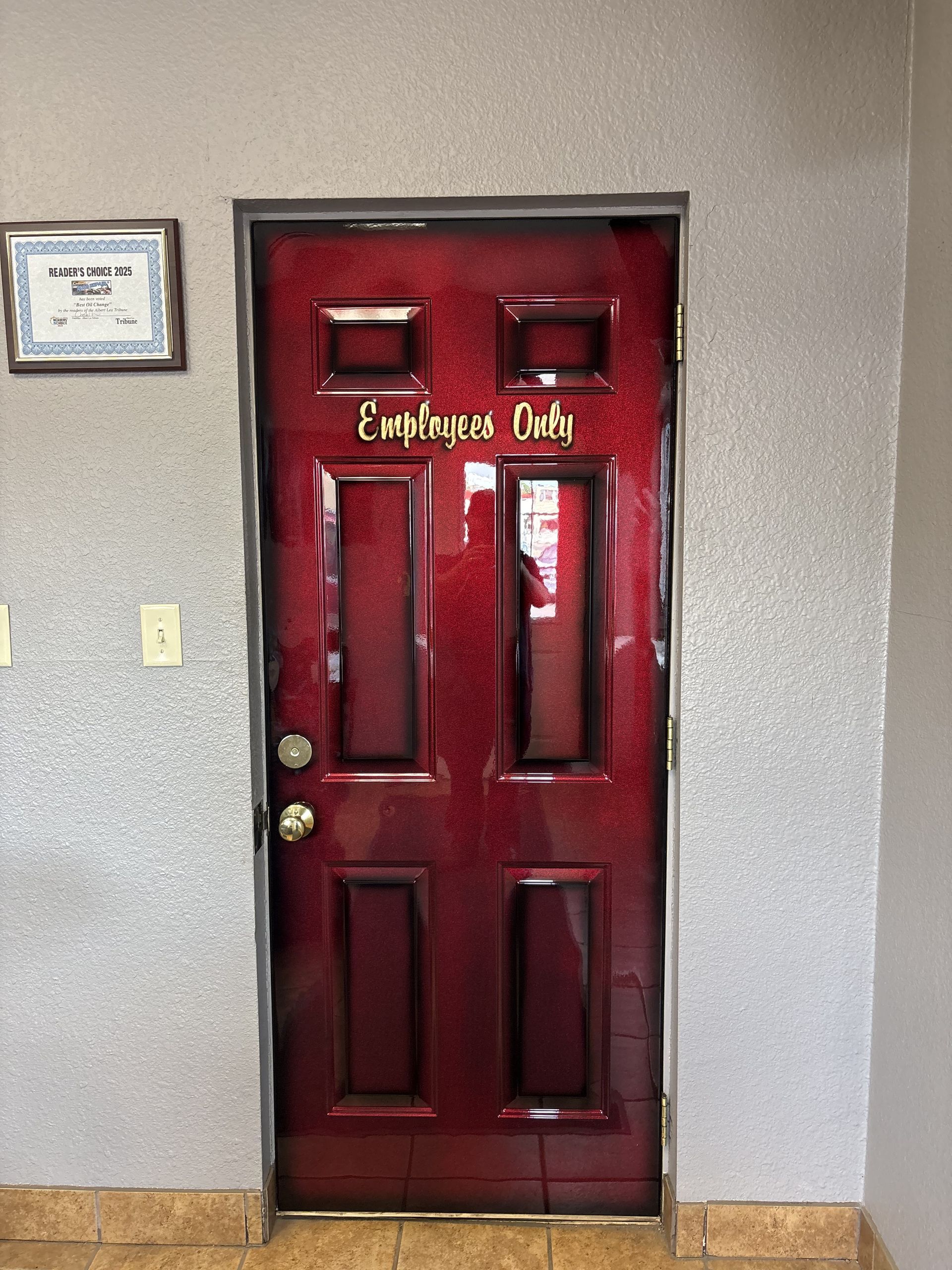 Red door labeled 