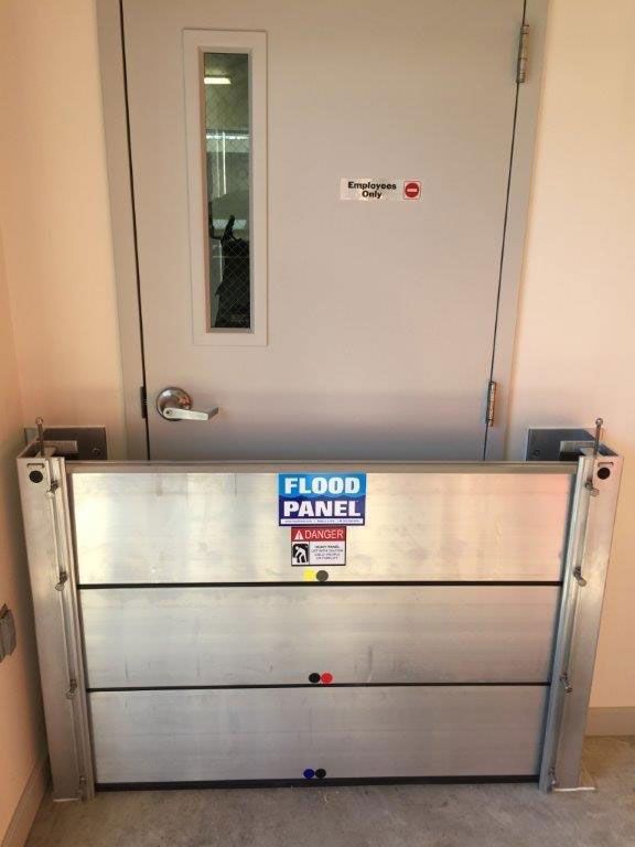 A flood panel is sitting in front of a door