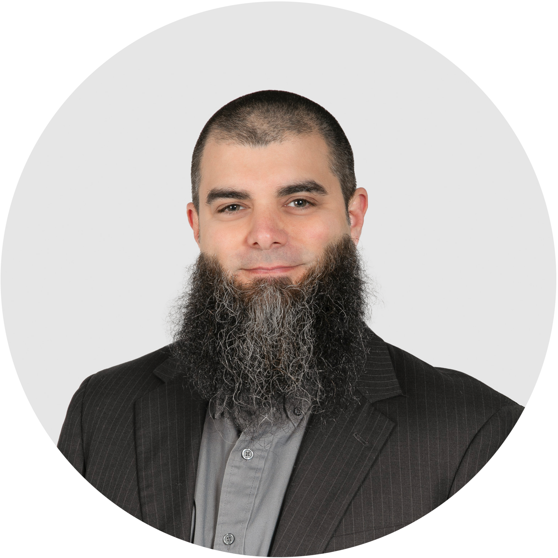 A man with a beard is in a circle on a white background.