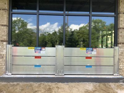 A building with a flood barrier in front of it