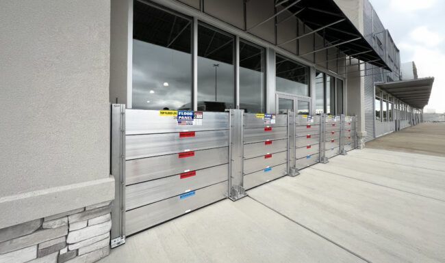 A row of flood barriers on the side of a building