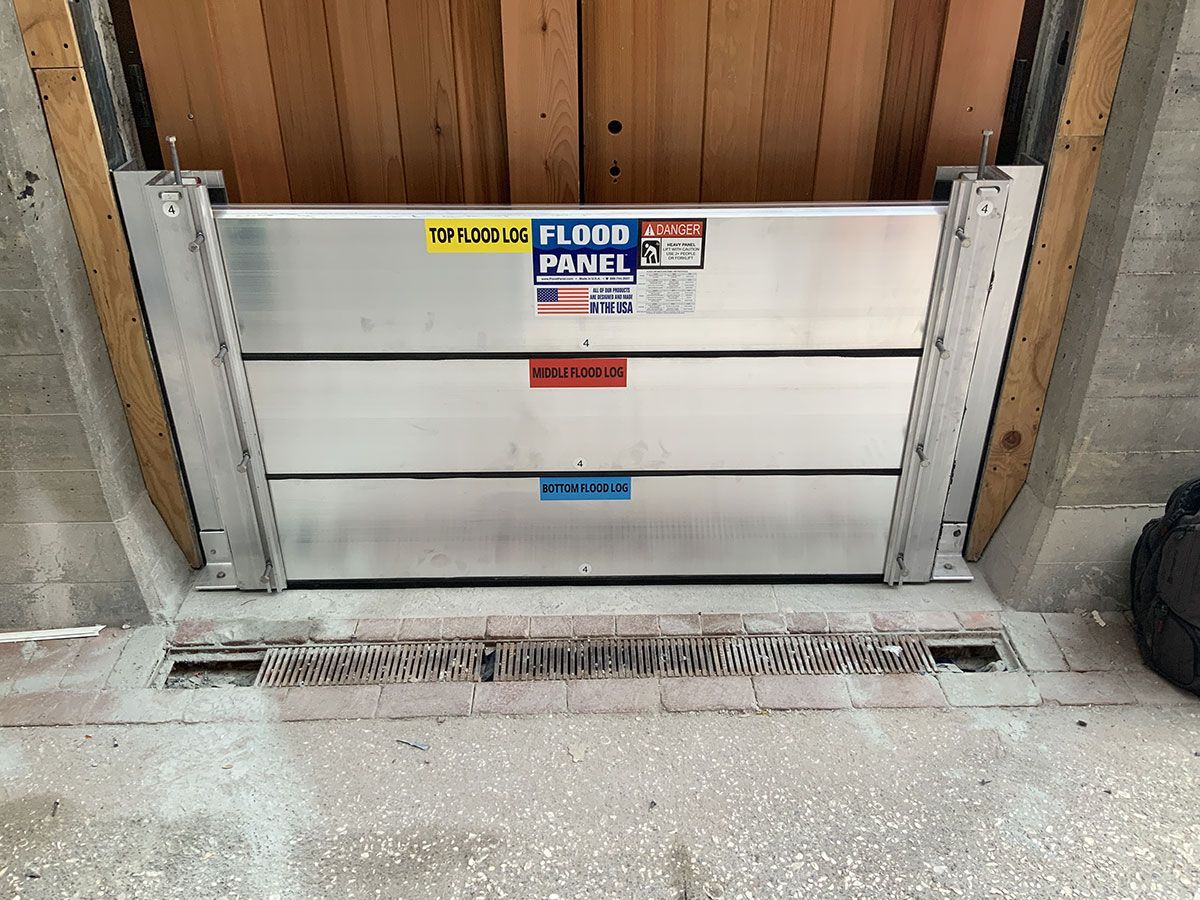 A door with a flood panel attached to it