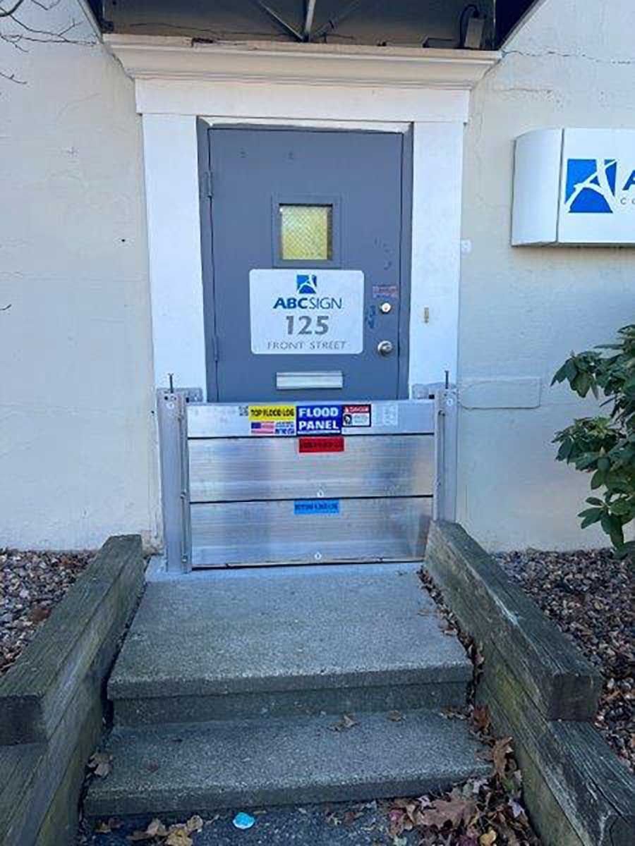 A door with a sign on it that says 125 on it
