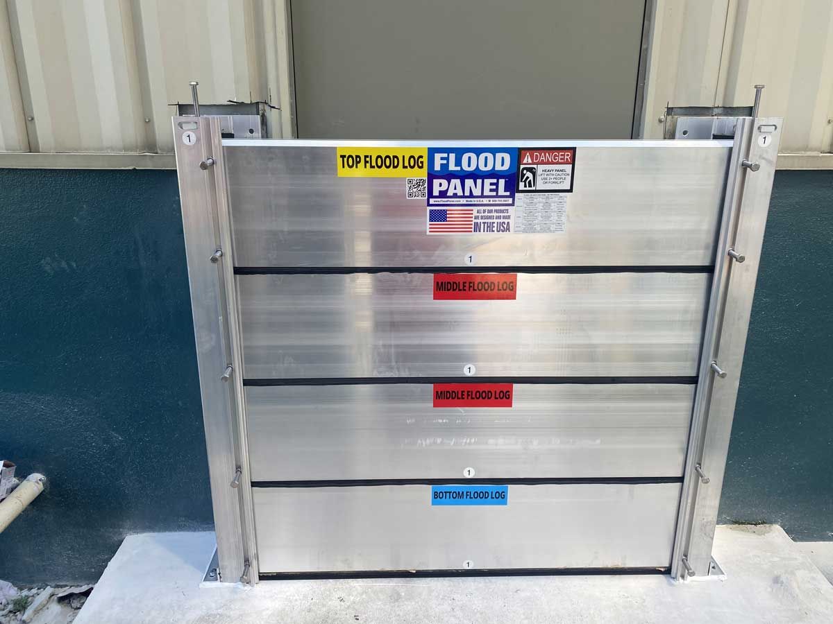 A flood panel is sitting in front of a building