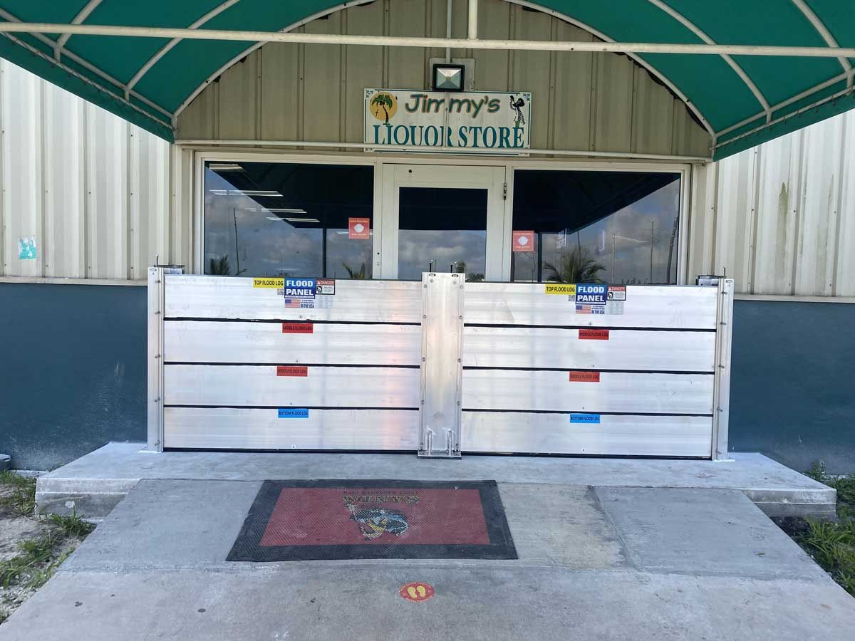 Jimmy 's liquor store has a flood barrier in front of it