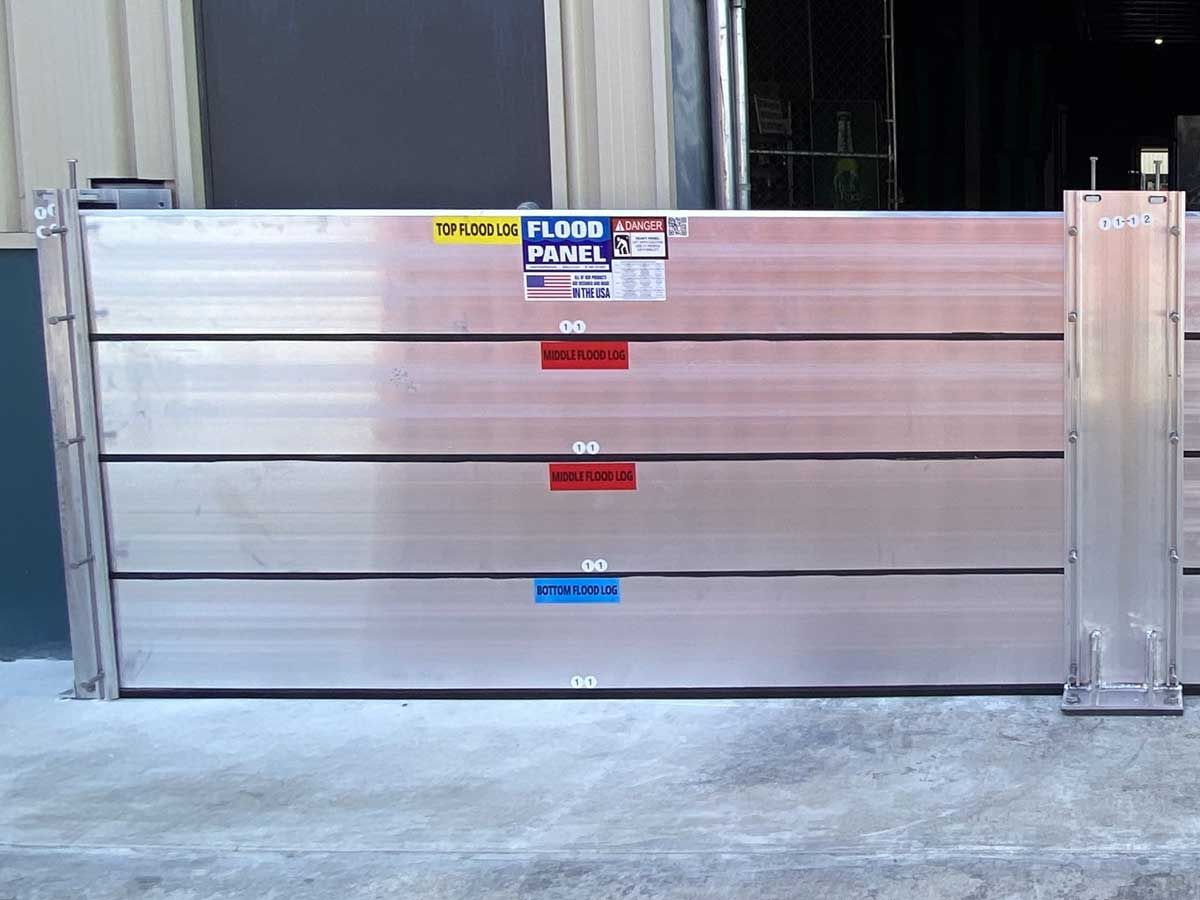 A flood barrier is sitting in front of a building.
