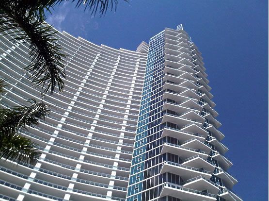A tall building with a blue sky in the background