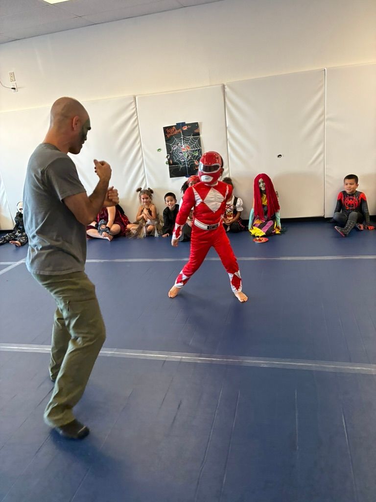 Coach Mark Miller instructing students on technique at Growth Mindset Collective