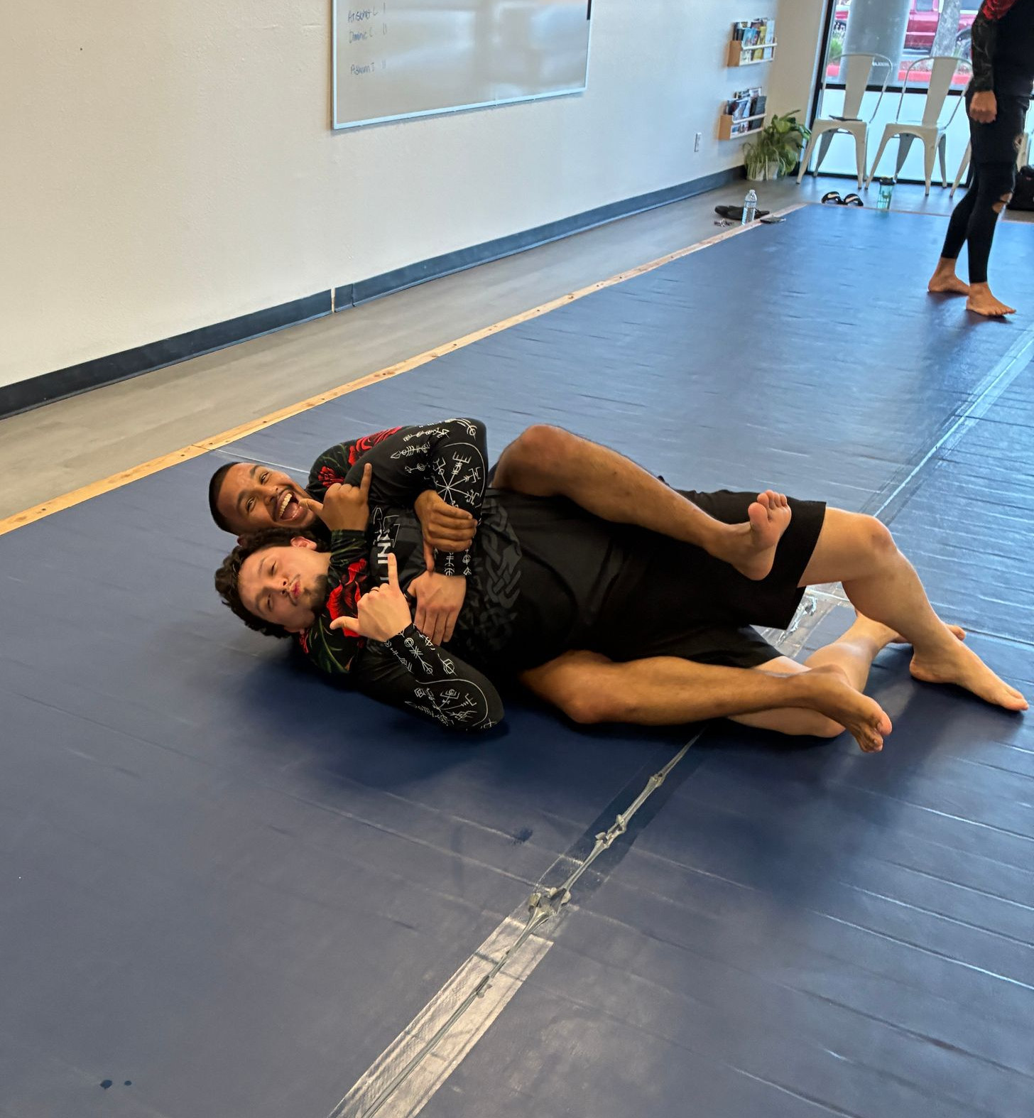 Adult gi BJJ sparring