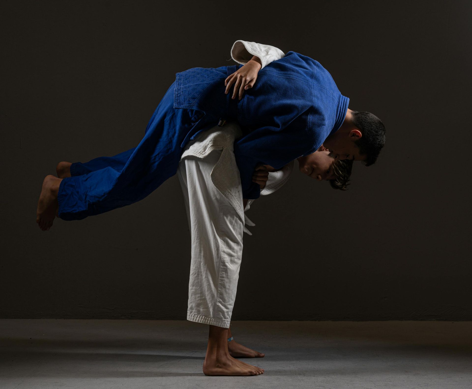 Adult gi BJJ sparring