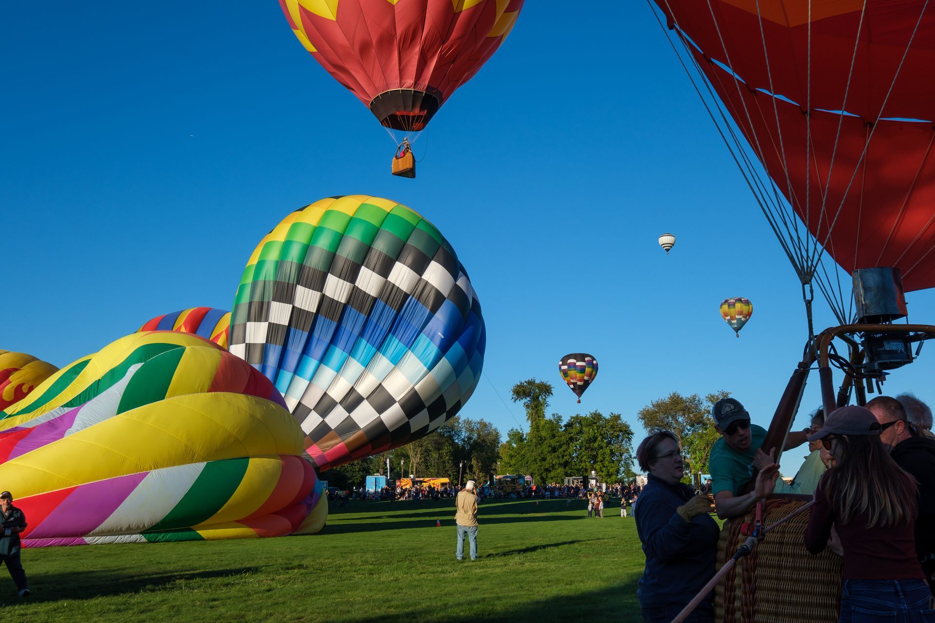Hot air balloons preparing for flight
