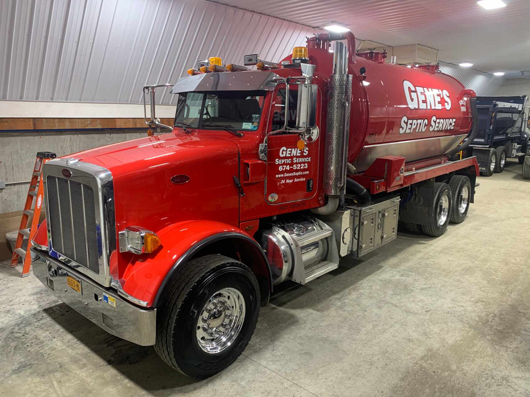 clean red vac truck