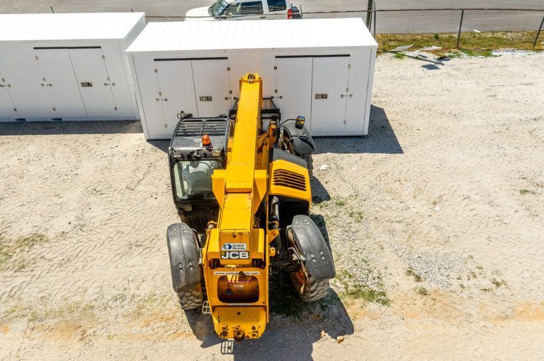 an aerial view of a yellow jcb tractor
