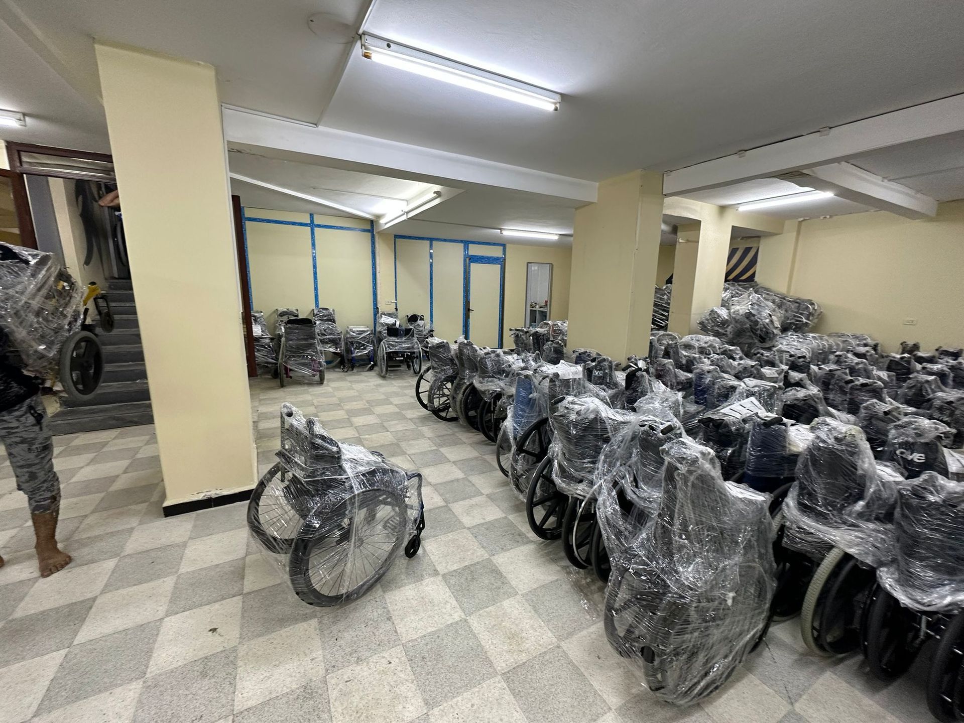 FPI & WarmHeart's wheelchair and medical relief. 