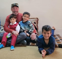 Michael Parks and children in the Middle East