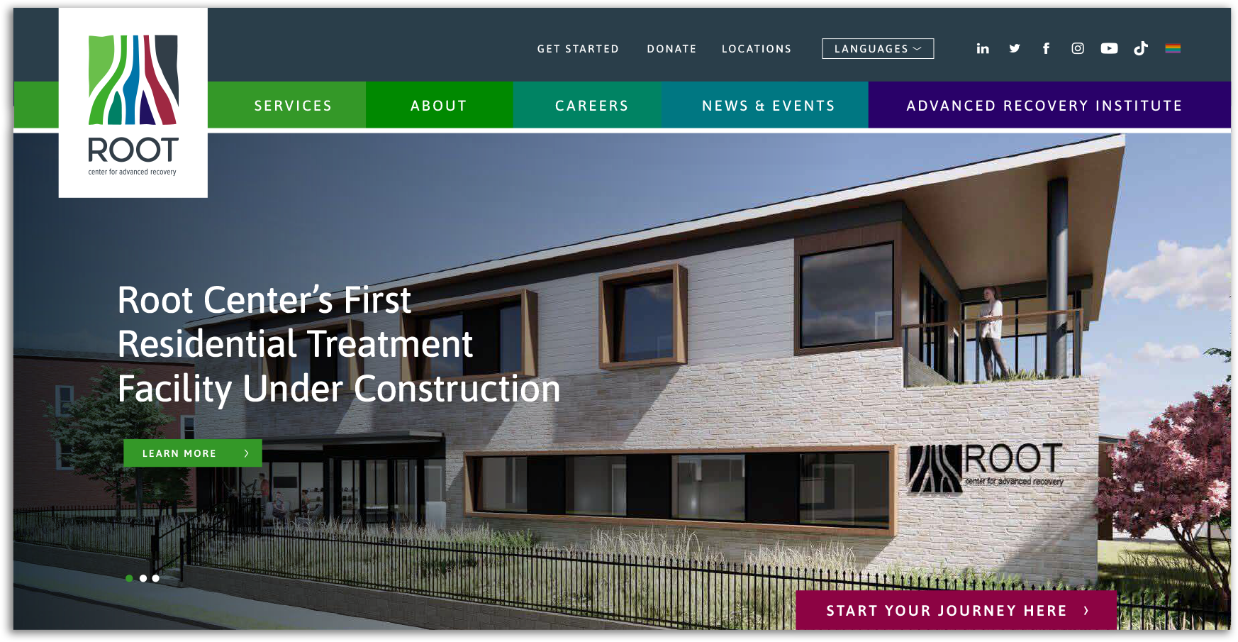 Root Center's Building exterior with logo and website navigation.