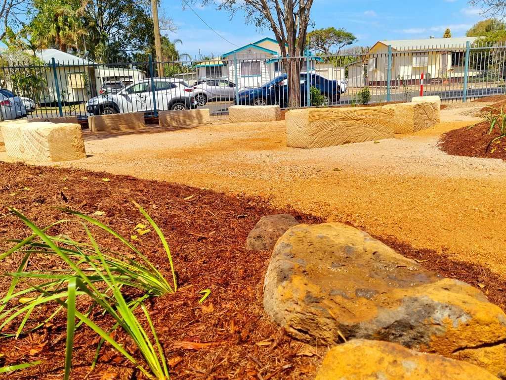 Stone Blocks in a Gravel Area With Mulch and Plants — On The Mark Landscaping in Branyan, QLD