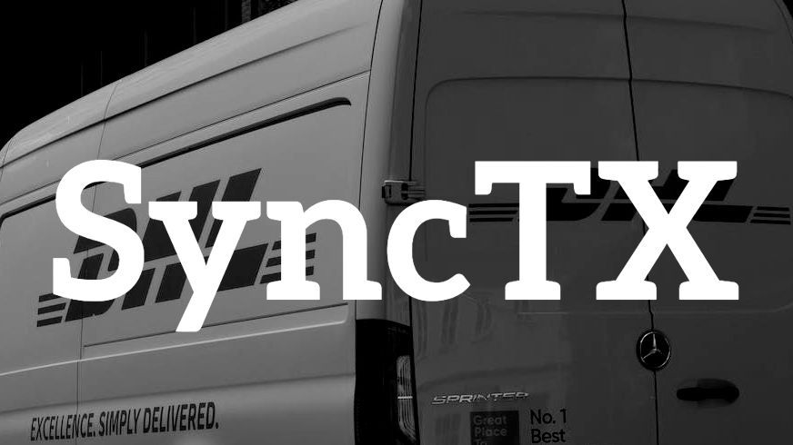 A black and white photo of a sync tx van