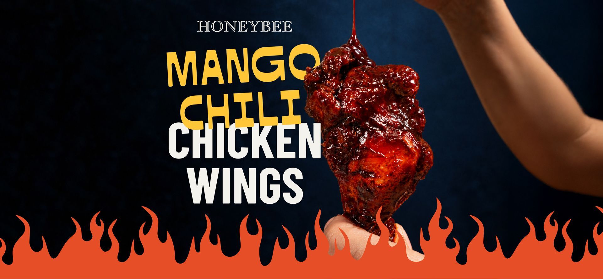 Honey-busy mango chili chicken wings with fiery red sauce on a dark background