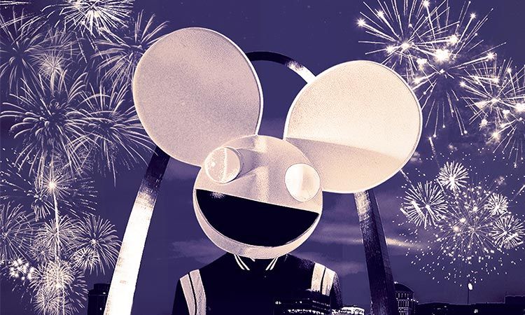 Large Mickey Mouse figure against a purple night sky with fireworks bursting behind it