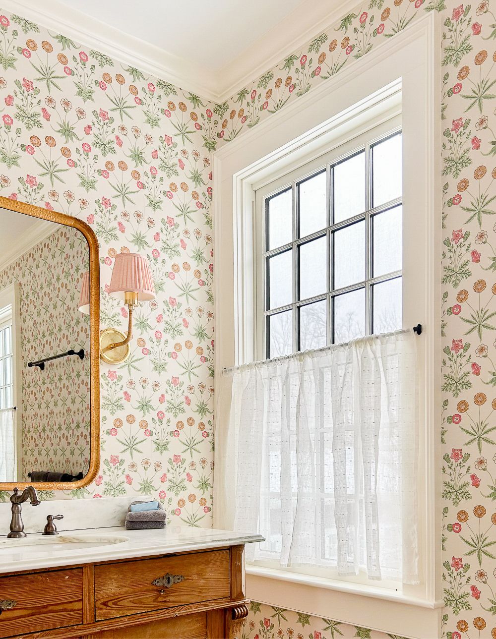 bathroom with floral wallpaper